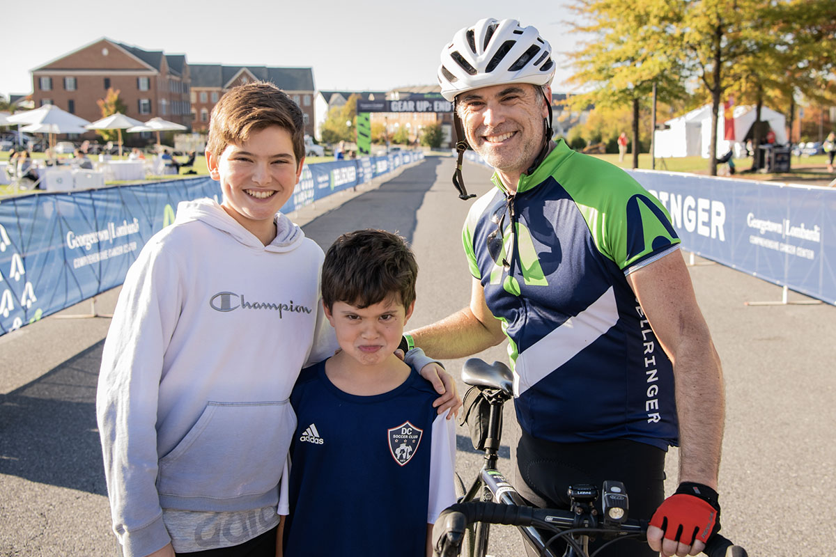 BellRinger rider with his children at the finish line in Urbana, MD