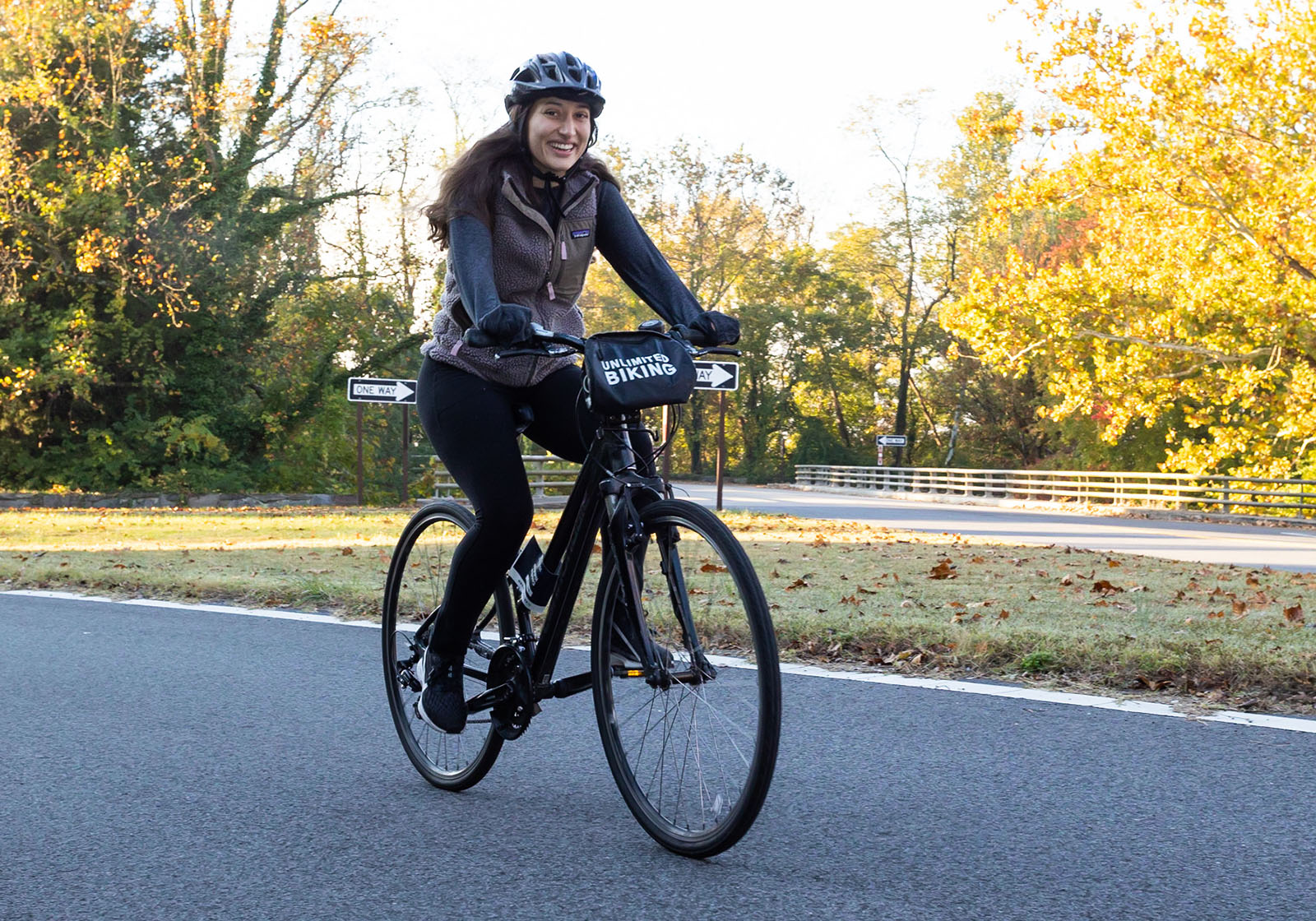 BellRinger rider on her bike on scenic road