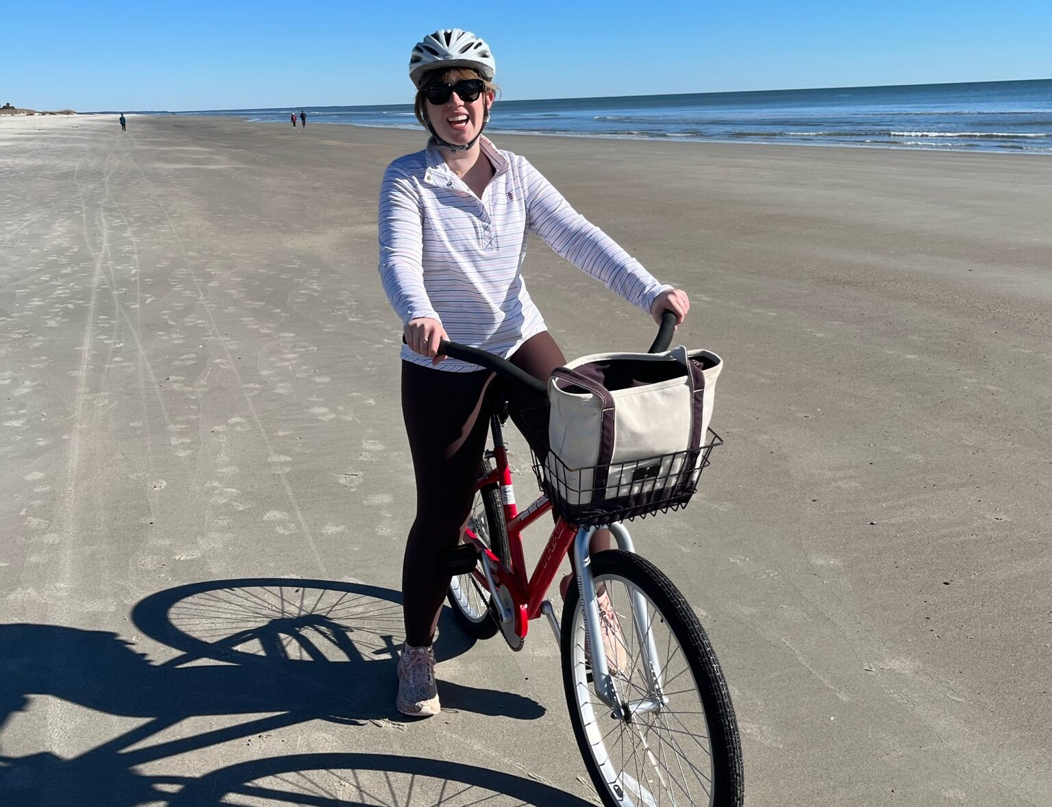 BellRinger rider on her bike the beach