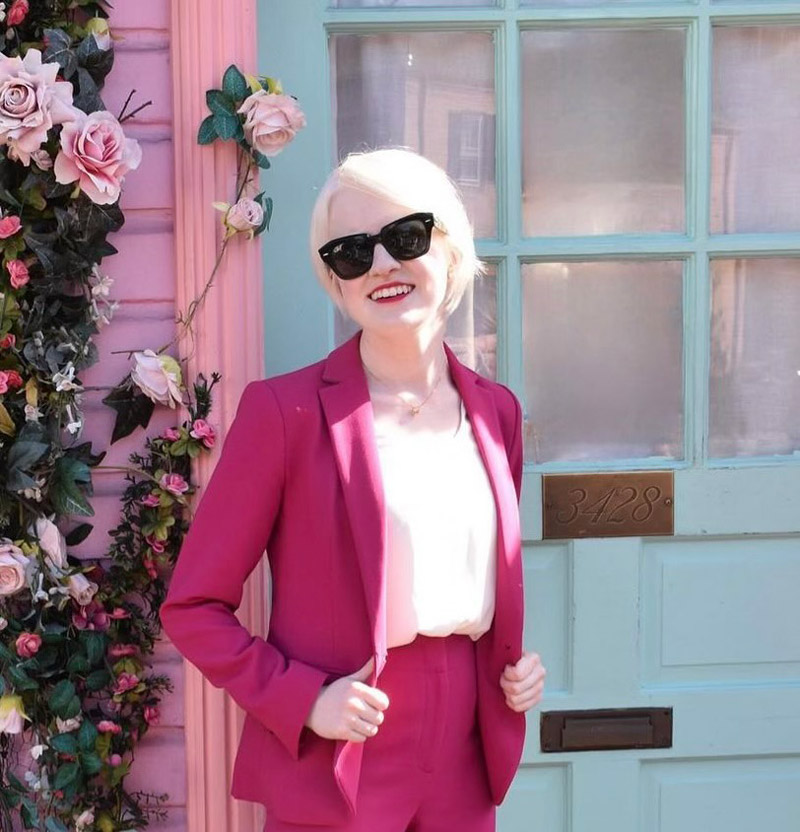 Marissa Nissley Headshot in Pink Suit